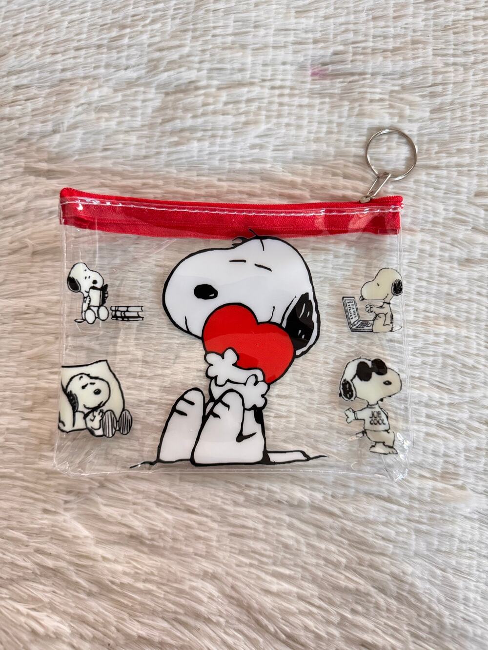Snoopy clear pouch with Snoopy holding a red heart keychain zipper
